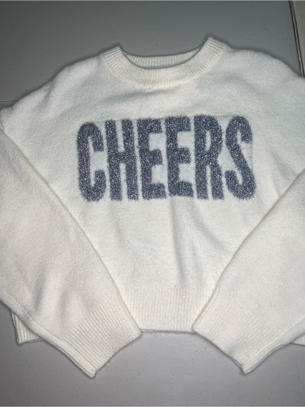 GBG Los Angeles White Crewneck Sweater with Gray 'CHEERS' Lettering